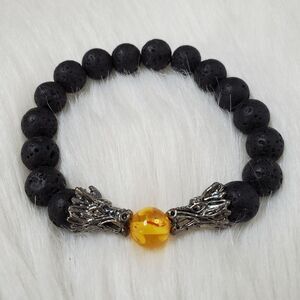 ESSENTIAL CHARMS silver dragons design black lava beaded bracelet